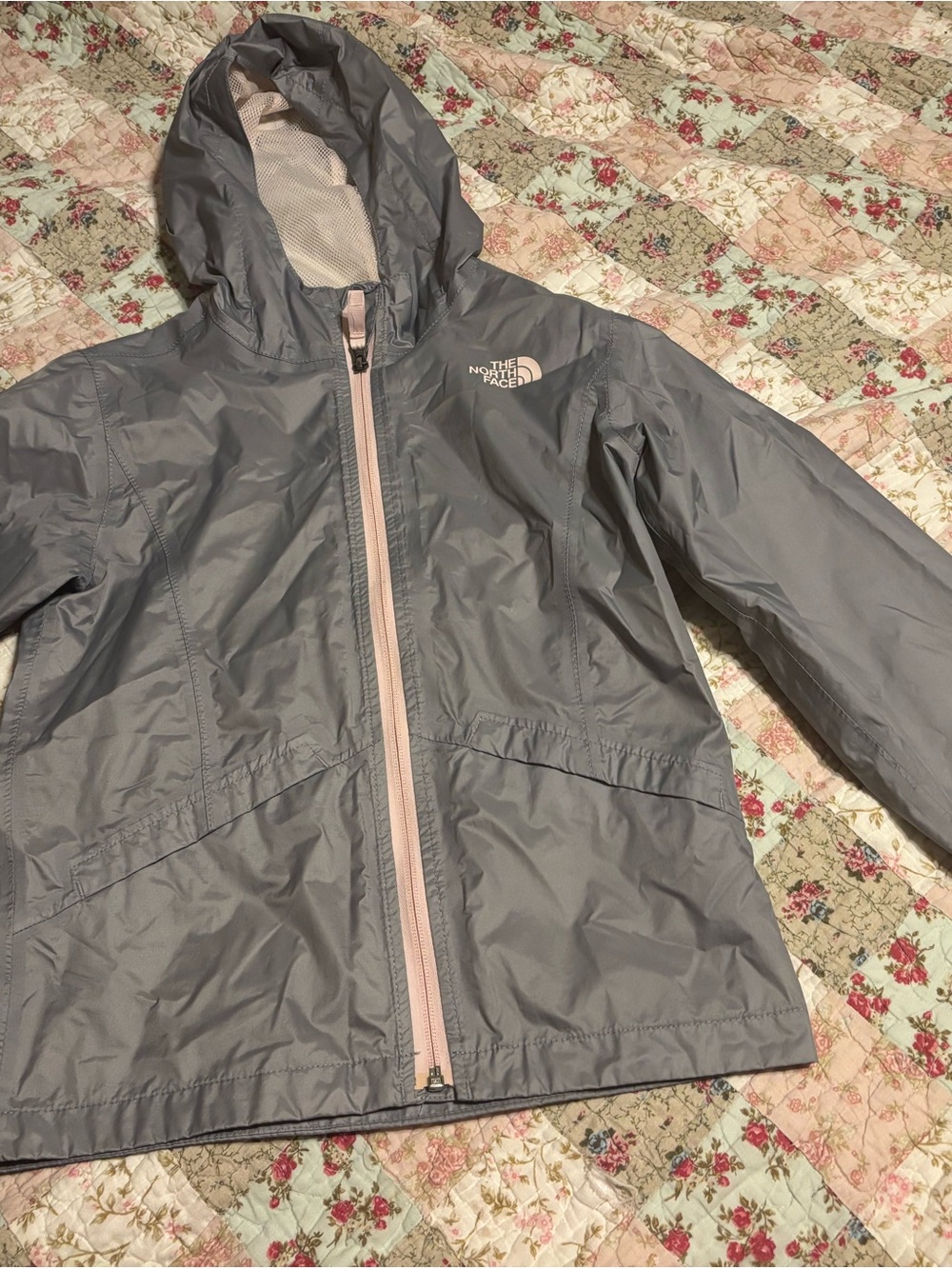 The North Face Girls' Light Gray Hooded Rain Jacket with Pale Pink Zipper